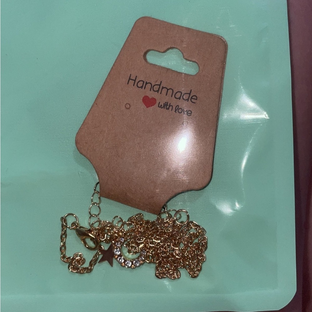 Golden moon and star necklace